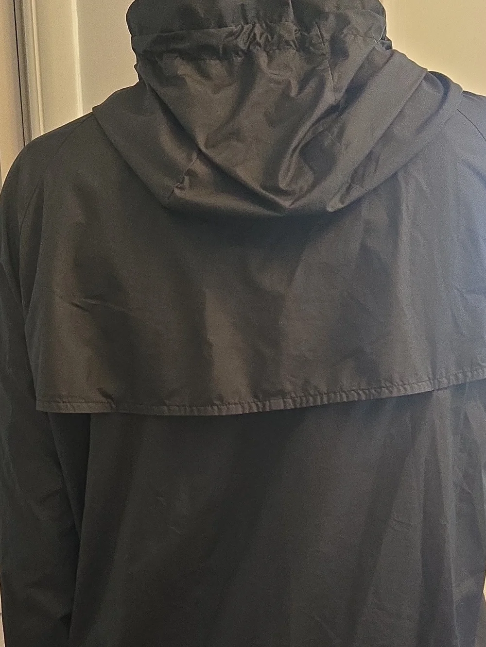 Nike Black Hooded Windbreaker with White Swoosh